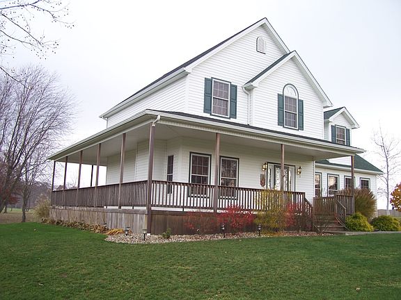 Front with view of wrap around porch