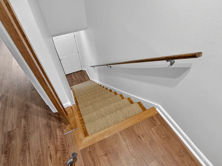 Two-story condo where the bedrooms and full bathroom are on the second floor.