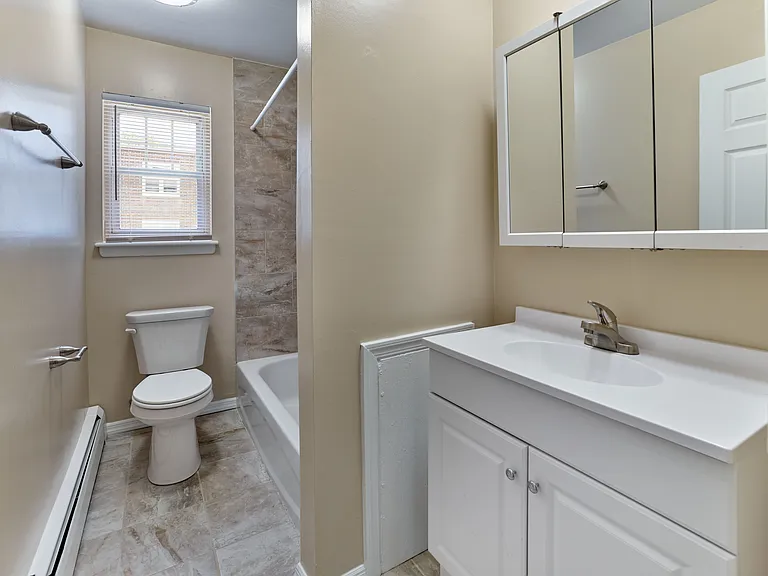 Clean and updated bathroom with stylish finishes at 42 West Apartments in Merchantville, NJ