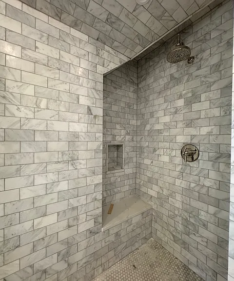 Master stand-up shower with ledge