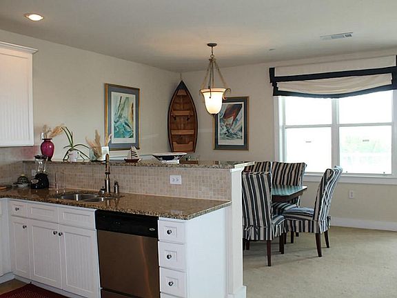 Tile back splash, spacious dining with views of the beach.