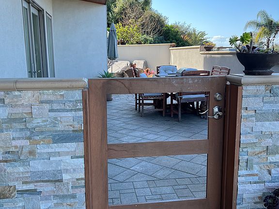 Gate entrance to apartment's private patio and front door.