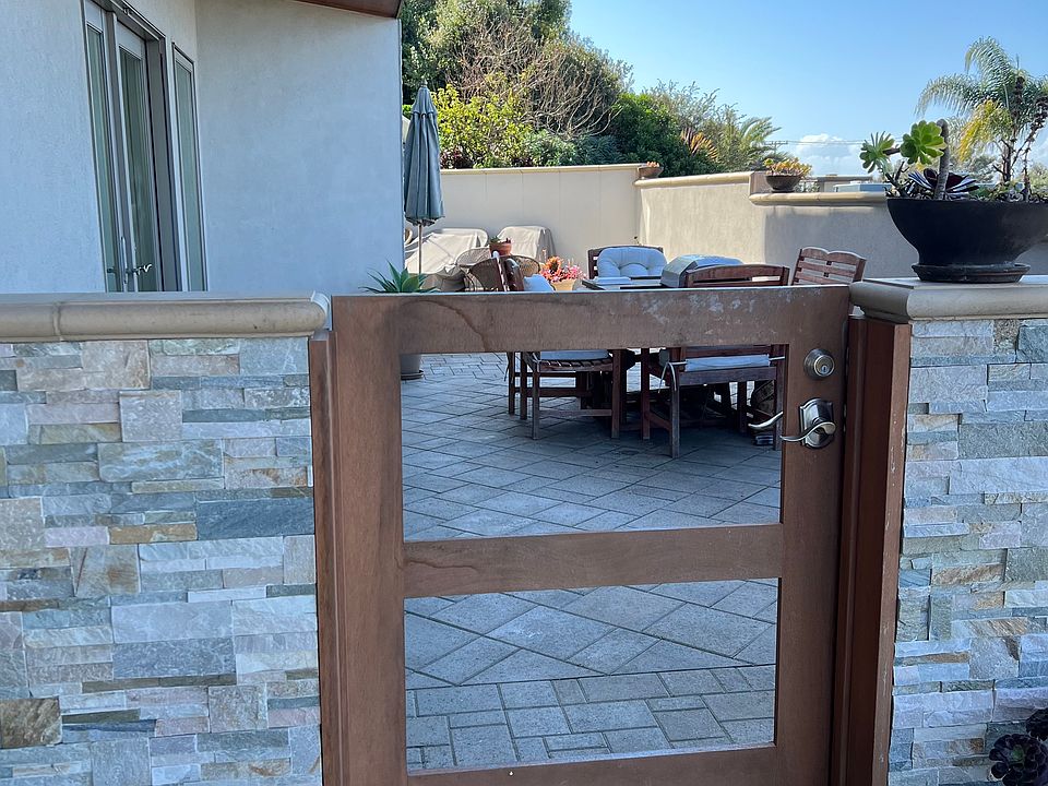 Gate entrance to apartment's private patio and front door.