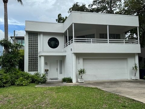 2910 West Bay Villa Avenue- Built in 1991, Single (Owner) Occupied Since Construction. It is Built-Up off of the Street and also has an 18-19' Foot Elevation Above Sea-Level and Does Not Flood. (It is Not in Current FEMA Flood Plain) (Current Photo).