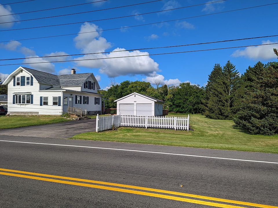 Side yard with large 2 car garage