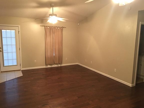 Large, open living room with cathedral ceilings