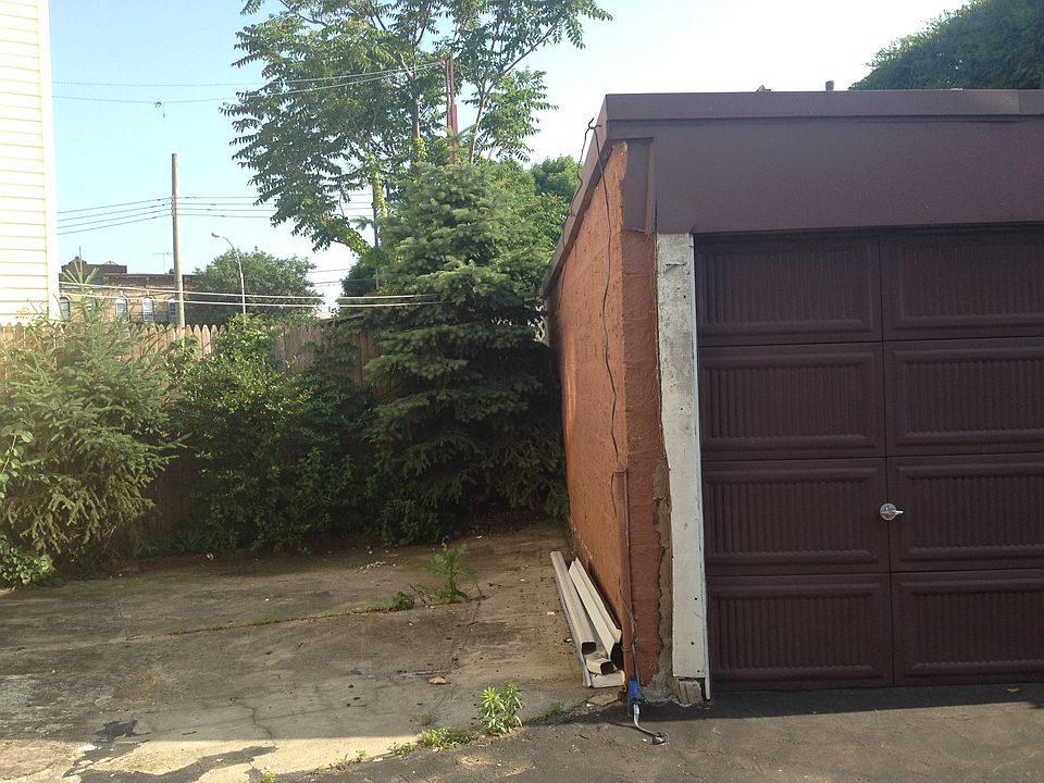 Back Yard and one Car Garage