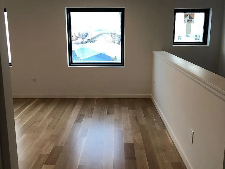 Standing in hallway looking towards living room