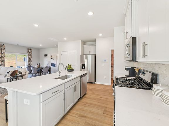Kitchen in the Jade floorplan at a Meritage Homes community in Mebane, NC.