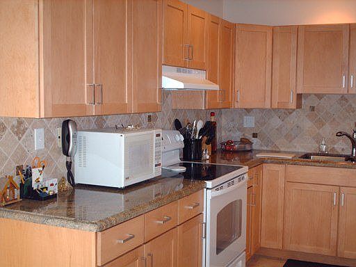 Wood/Granite/Tumbled Stone Backsplash