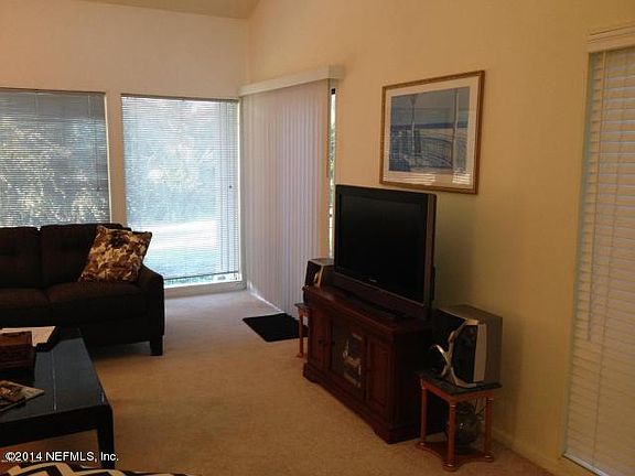 4th image of 10021 SAWGRASS Drive W