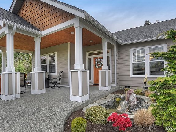 Like new home with beautiful water feature and landscaping