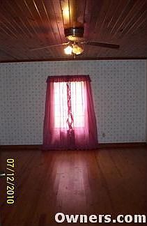 master bed w/hardwood floors & ceiling