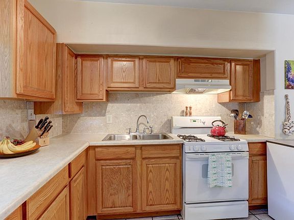 KITCHEN WITH LOTS OF CABINET&COUNTER SPACE, LG REFRIGERATOR, GAS STOVE AND DISHWASHER