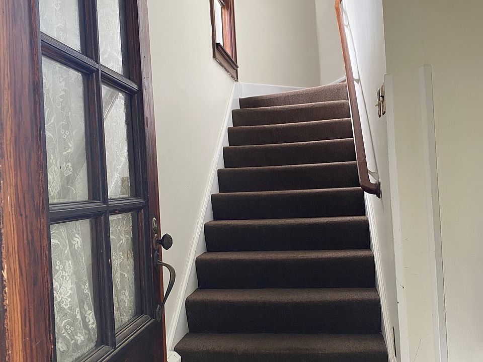 front door and steps to the unit