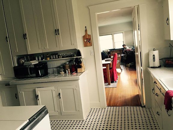 Kitchen looking through to dinning broom and living room