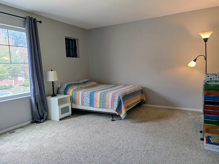 12.5' x 14' Upstairs Bedroom with 8.5' x 5' walk-in closet.