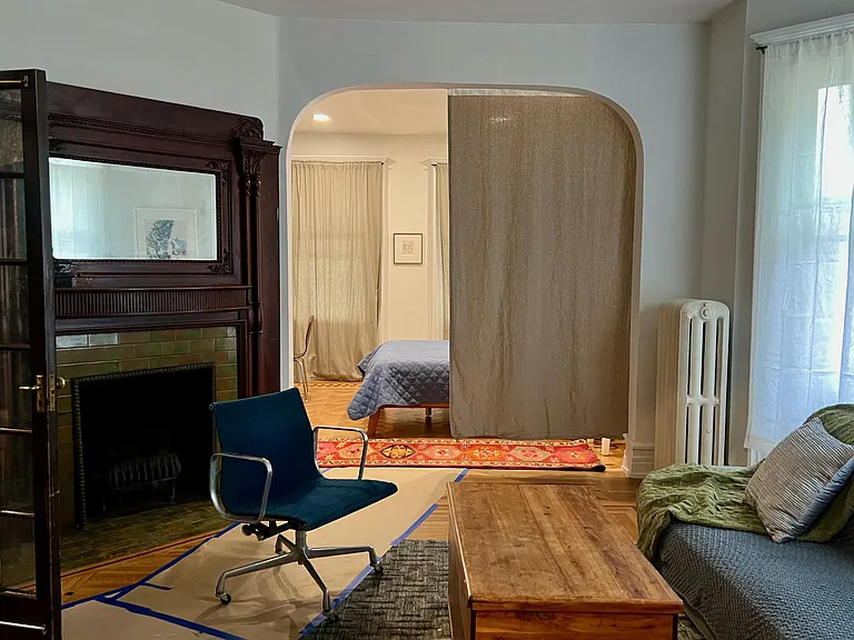 We currently have this room as a second bedroom with a curtain. I could imagine the fireplace room with a dining room table and the "second" bedroom with a couch.