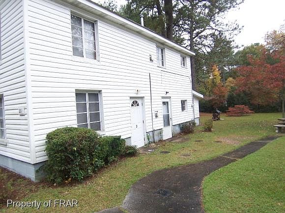 1st image of 201 Country Club Dr APT 1