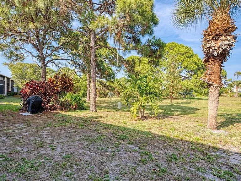 Grilling in paradise. __ Take your evening meal outdoors! This barbecue area offers a front-row seat to the lush greenery of the preserve. It's quiet, scenic, and ready for your next Florida feast.