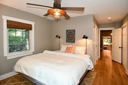 Main floor en suite with queen bed