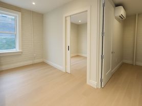 241 W 13th St