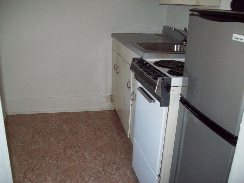Kitchen before new flooring