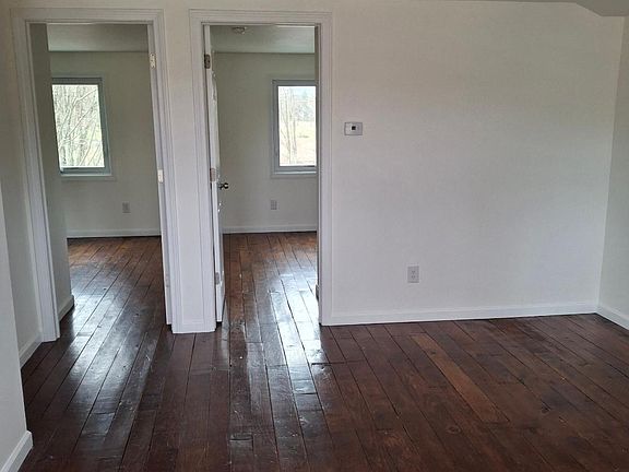 Living room facing 2 bedrooms