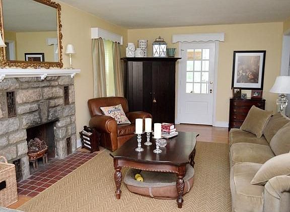 Hardwood floors and door to sun porch