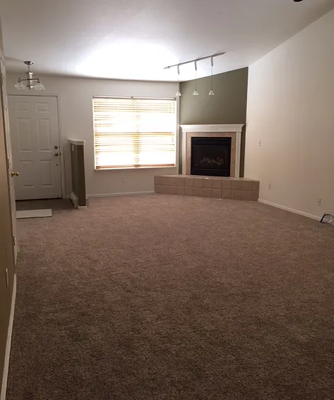 Living room, looking back at the main door.