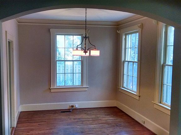 Iconic Cloverdale arched entryway into the dining room