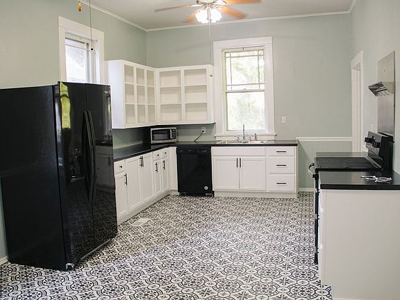 Newly renovated eat-in kitchen with new flooring, cabinets and countertops.