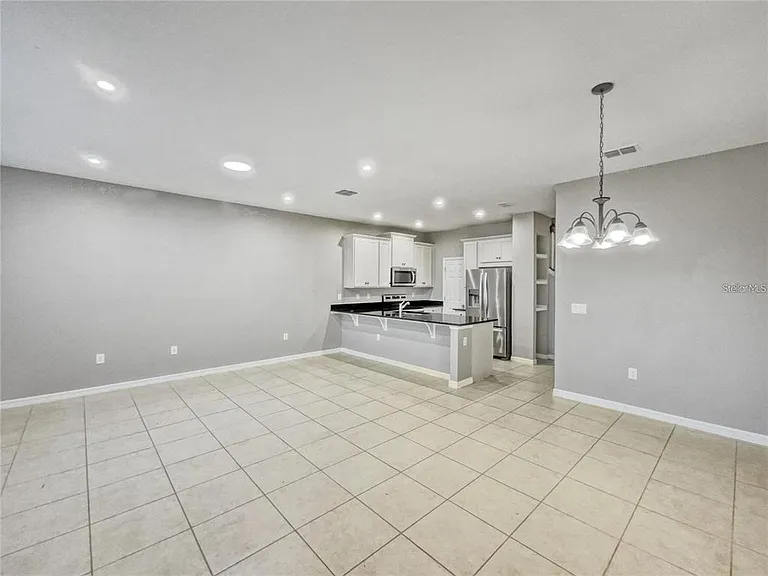 2424 Blowing Breeze Ave — Photo 5