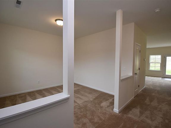 Front entrance with dining room