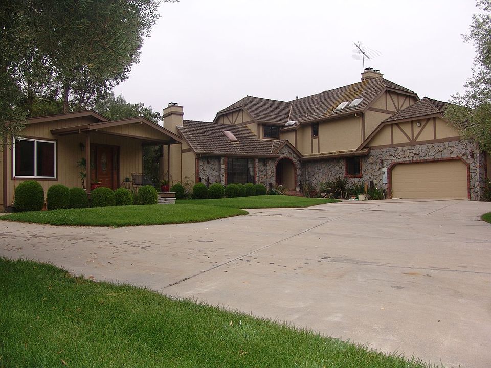 Sandwich Generation Home with 11 Car Garage and a Drive Thru Barn