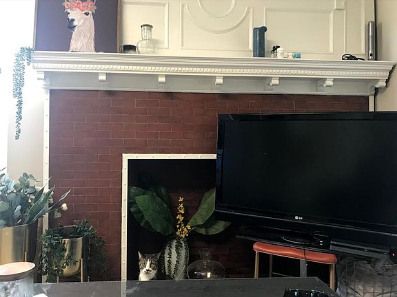 Unique brick fireplace and mantle