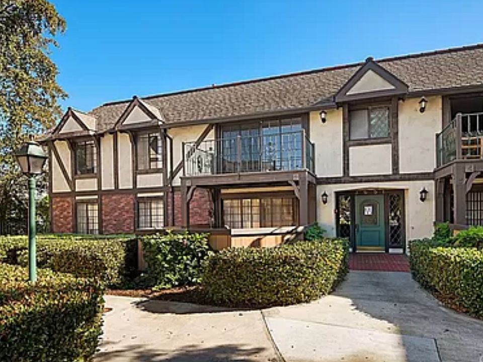Exterior, unit's balcony in middle of photo