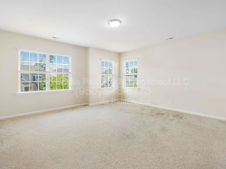 10697 Sky Chase Ave NW — Photo 23