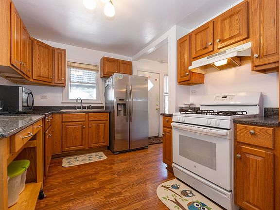 Updated kitchen with window overlooking the backyard.