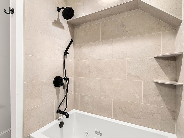 Jacuzzi tub and Imported tile bath surround