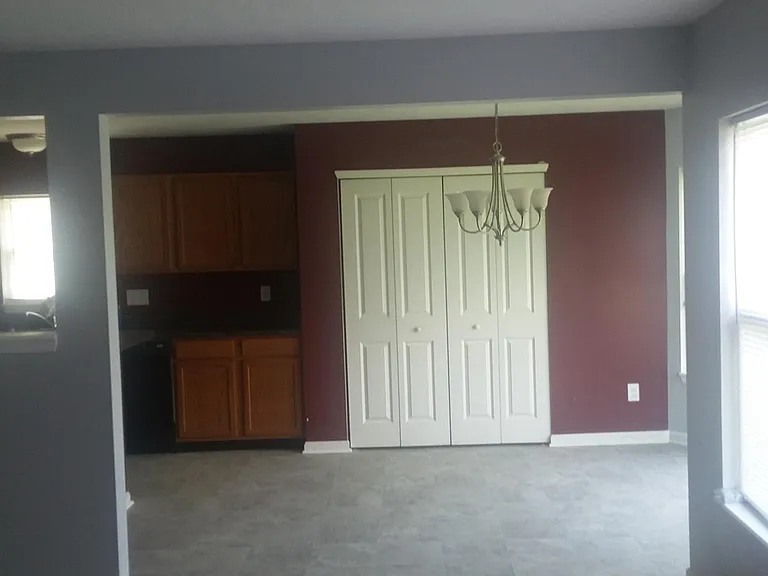 BREAKFAST NOOK WITH PANTRY VIEW FROM FAMILY ROOM