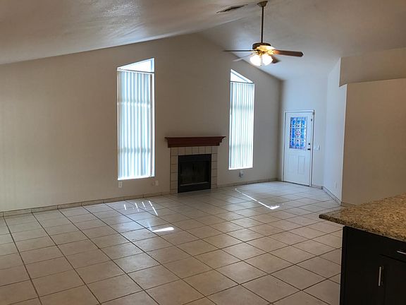 Fireplace in large open concept great room.