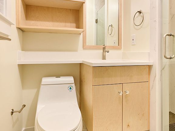 First bedroom's private bath.