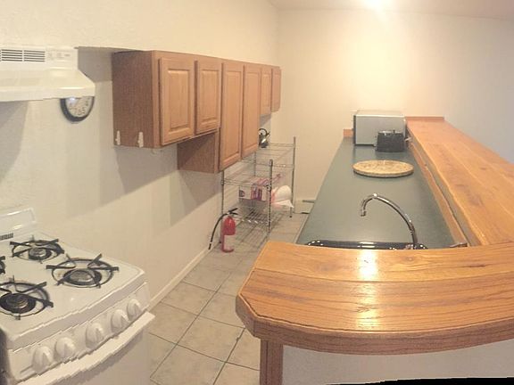 Kitchen opens to living room