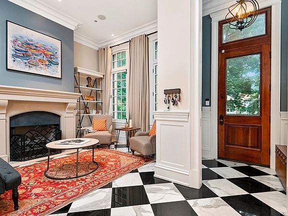 Welcome guests into your formal foyer and coat room