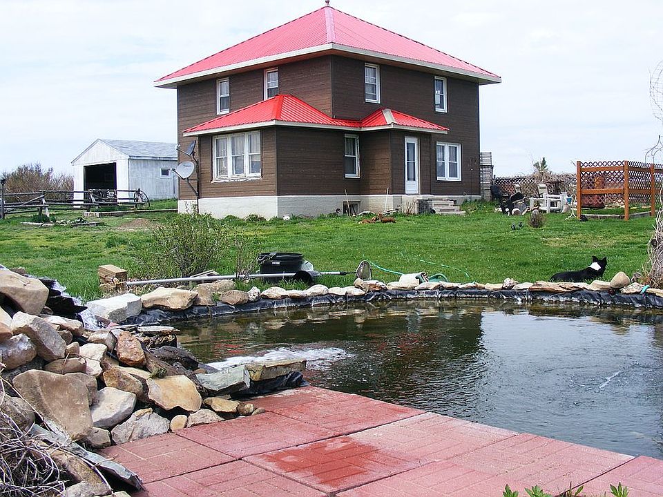 27 Acres historic home/pond