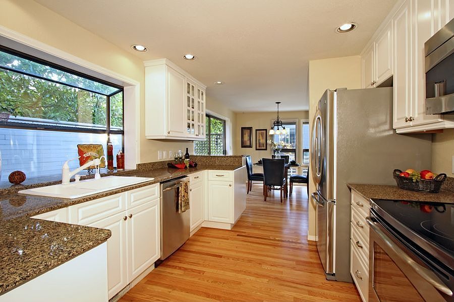 Granite, stainless and hardwood accents