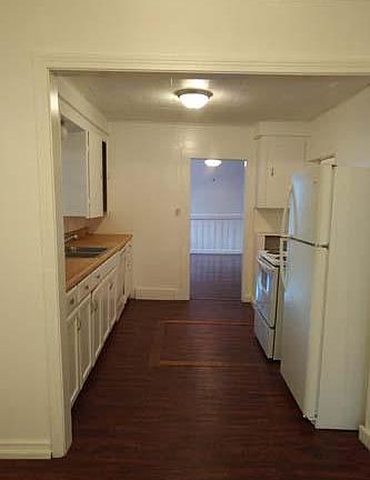 View from the dining room into the kitchen.