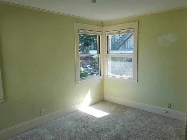 View of bedroom and window view.