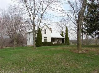 6040 Tripp Rd, Osseo, MI 49266